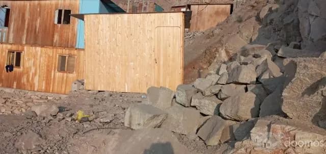 VENTA DE LOTE CON CUARTO PREFABRICADO — foto 1