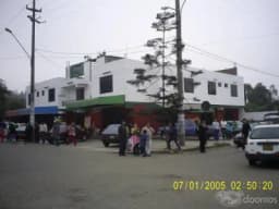 VENTA DE ACCIONES DE TERRENO Y LOCAL COMERCIAL