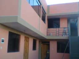 VENTA DE TERRENO - CON CONSTRUCCION