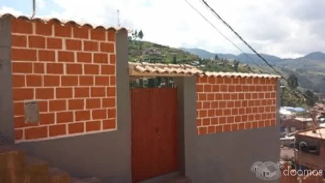VENTA DE TERRENO - CON CONSTRUCCION — foto 2