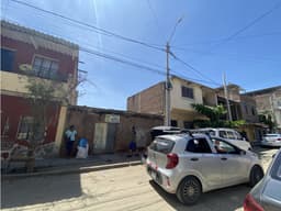 VENDO TERRENO FRENTE AL MERCADO